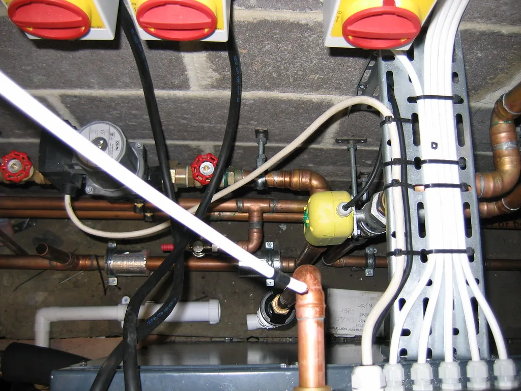 Technician reviewing a newly installed system with the homeowner